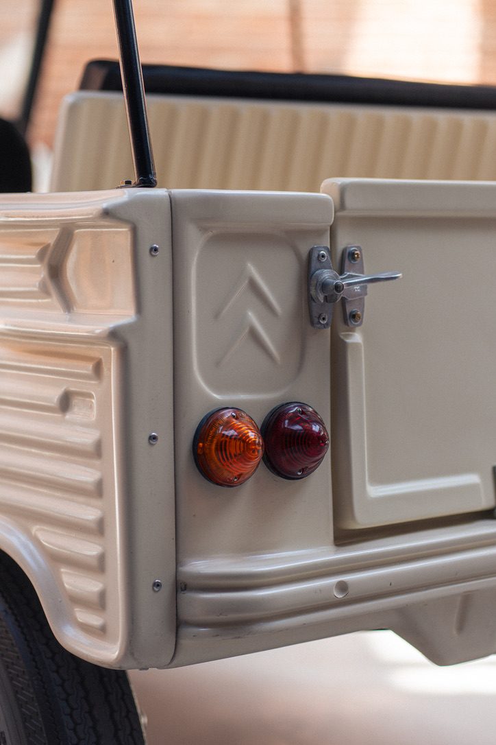 Double chevron Citroën emblem on the cream rear panel of a Méhari